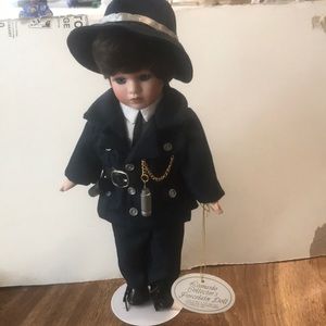 New !!   Leonardo Collectors Porcelian doll.  his name is Policeman , a rare